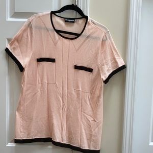 Light weight shell top Nylon and Rayon blend. Perfect with black pants or skirt